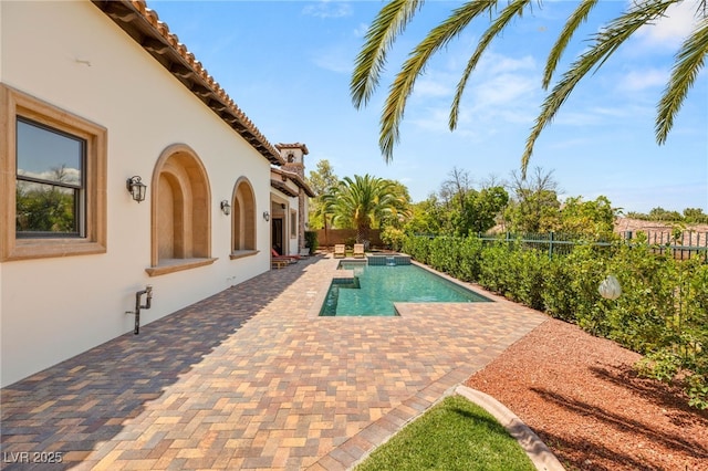 38 Pebble Dunes Ct, Las Vegas, NV 89141 - view of pool with a patio area, a fenced backyard, and a pool with connected hot tub