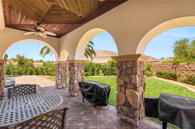 38 Pebble Dunes Ct, Las Vegas, NV 89141 - view of patio / terrace with grilling area, a ceiling fan, and outdoor dining space
