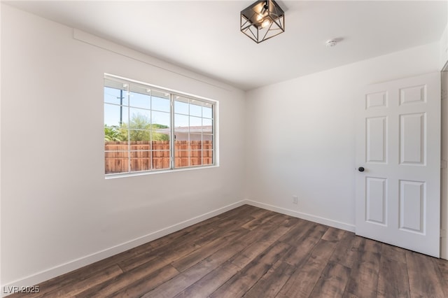 1313 Purple Sage Ave, Las Vegas, NV 89108 - unfurnished room featuring dark wood finished floors and a smoke detector