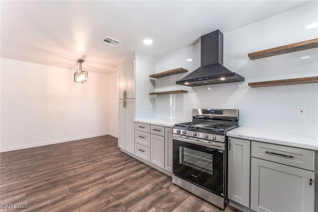 1313 Purple Sage Ave, Las Vegas, NV 89108 - kitchen featuring extractor fan, stainless steel gas stove, open shelves, dark wood-style flooring, and light stone counters