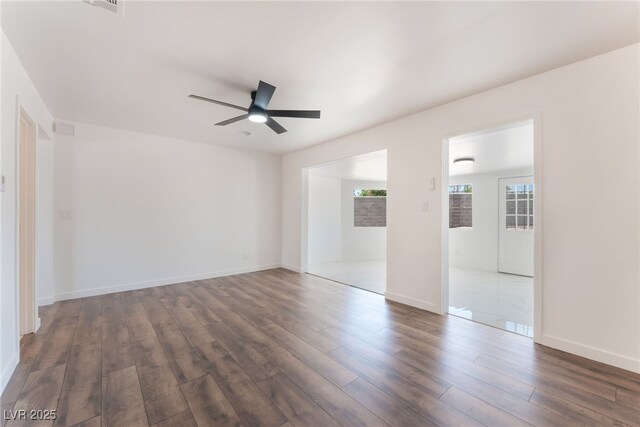 1313 Purple Sage Ave, Las Vegas, NV 89108 - unfurnished bedroom featuring dark wood-type flooring and ceiling fan