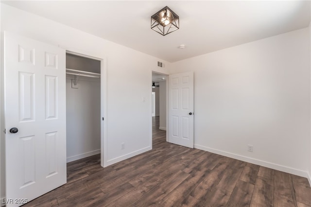 1313 Purple Sage Ave, Las Vegas, NV 89108 - unfurnished bedroom with dark wood-style floors and a closet