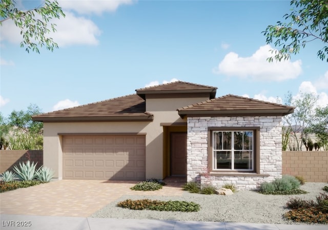 881 Cottonwood Hill Pl, Henderson, NV 89011 - view of front of property featuring stucco siding, an attached garage, stone siding, and decorative driveway