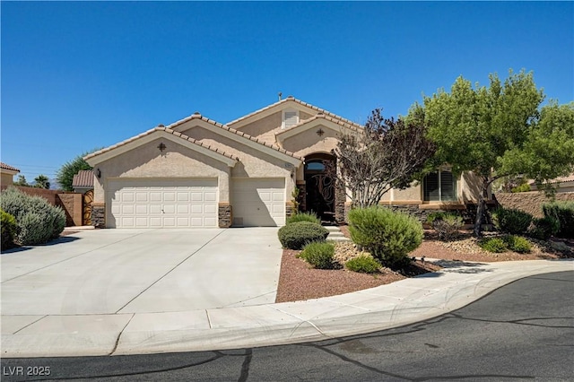 8204 Turbys Treehouse Pl, Las Vegas, NV 89131 - view of front of property featuring stucco siding, a garage, driveway, and stone siding