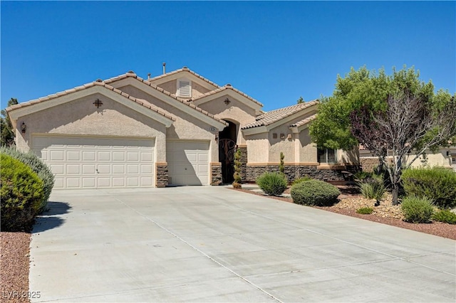 8204 Turbys Treehouse Pl, Las Vegas, NV 89131 - view of front of property featuring an attached garage, driveway, stucco siding, a tiled roof, and stone siding