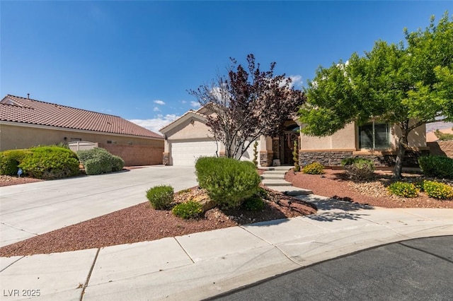 8204 Turbys Treehouse Pl, Las Vegas, NV 89131 - view of front of house with stucco siding, concrete driveway, an attached garage, stone siding, and a tiled roof