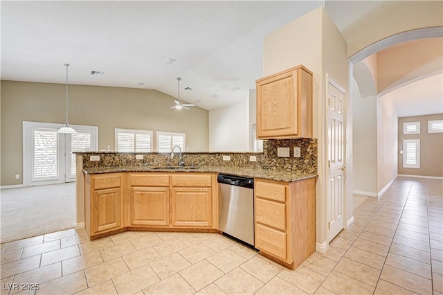8204 Turbys Treehouse Pl, Las Vegas, NV 89131 - kitchen featuring dishwasher, ceiling fan, lofted ceiling, arched walkways, and light brown cabinetry