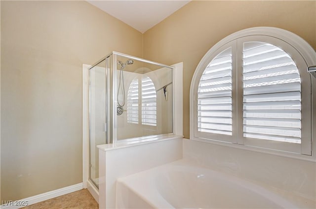 8204 Turbys Treehouse Pl, Las Vegas, NV 89131 - bathroom featuring a bath and a shower stall