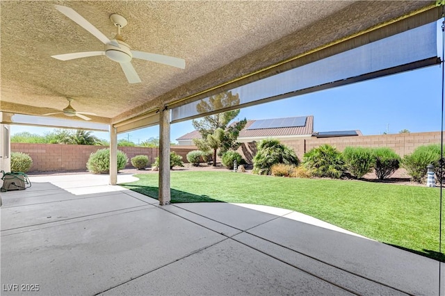 8204 Turbys Treehouse Pl, Las Vegas, NV 89131 - fenced backyard featuring a ceiling fan and a patio