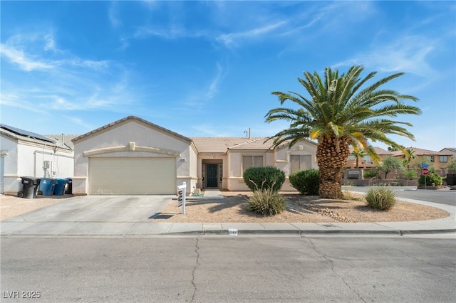 3108 Sentimental Ct, North Las Vegas, NV 89031 - view of front facade featuring stucco siding, an attached garage, concrete driveway, and a tiled roof