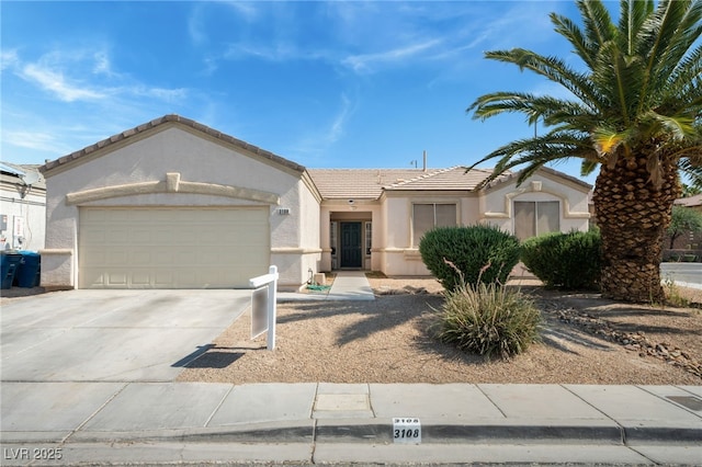 3108 Sentimental Ct, North Las Vegas, NV 89031 - single story home with stucco siding, a tile roof, a garage, and driveway