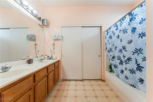 3108 Sentimental Ct, North Las Vegas, NV 89031 - bathroom featuring double vanity, tile patterned floors, and shower / bath combination with curtain