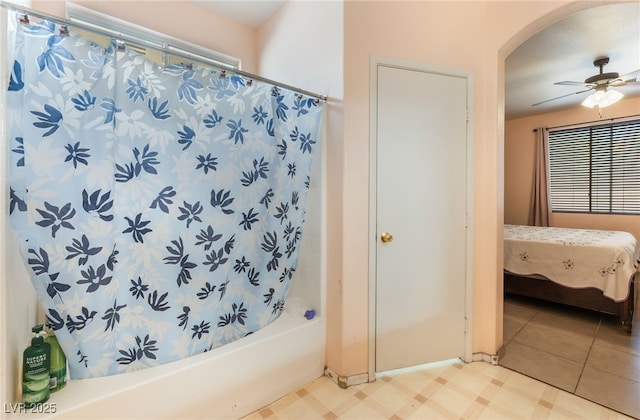 3108 Sentimental Ct, North Las Vegas, NV 89031 - ensuite bathroom with shower / bath combo with shower curtain, tile patterned floors, and a ceiling fan