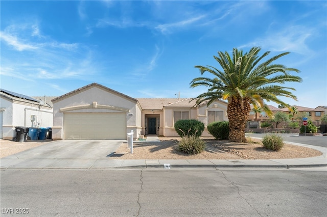 3108 Sentimental Ct, North Las Vegas, NV 89031 - view of front of house featuring an attached garage, stucco siding, driveway, and a tiled roof