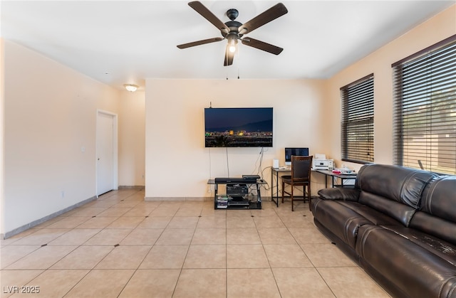 3108 Sentimental Ct, North Las Vegas, NV 89031 - tiled living room with a ceiling fan and a desk