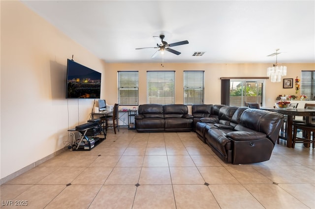 3108 Sentimental Ct, North Las Vegas, NV 89031 - living area with ceiling fan, a chandelier, and light tile patterned floors
