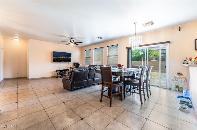 3108 Sentimental Ct, North Las Vegas, NV 89031 - dining space with a chandelier, light tile patterned floors, and a ceiling fan