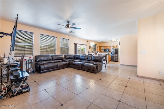 3108 Sentimental Ct, North Las Vegas, NV 89031 - living area with a ceiling fan and light tile patterned floors