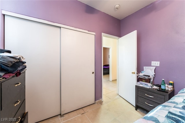 3108 Sentimental Ct, North Las Vegas, NV 89031 - bedroom with light tile patterned floors and a closet