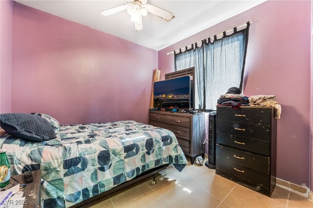 3108 Sentimental Ct, North Las Vegas, NV 89031 - bedroom with tile patterned flooring and ceiling fan