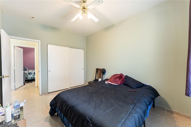 3108 Sentimental Ct, North Las Vegas, NV 89031 - bedroom featuring light tile patterned floors, a closet, and ceiling fan