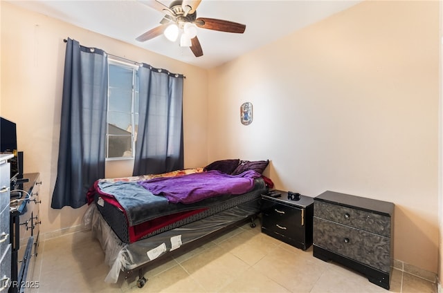 3108 Sentimental Ct, North Las Vegas, NV 89031 - bedroom with ceiling fan and light tile patterned floors