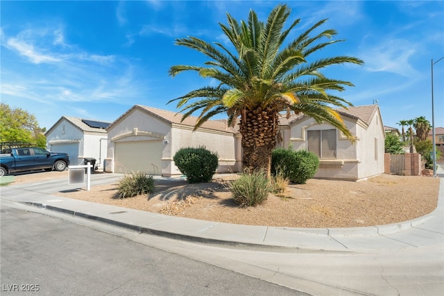 3108 Sentimental Ct, North Las Vegas, NV 89031 - view of front of house with driveway, stucco siding, and a garage