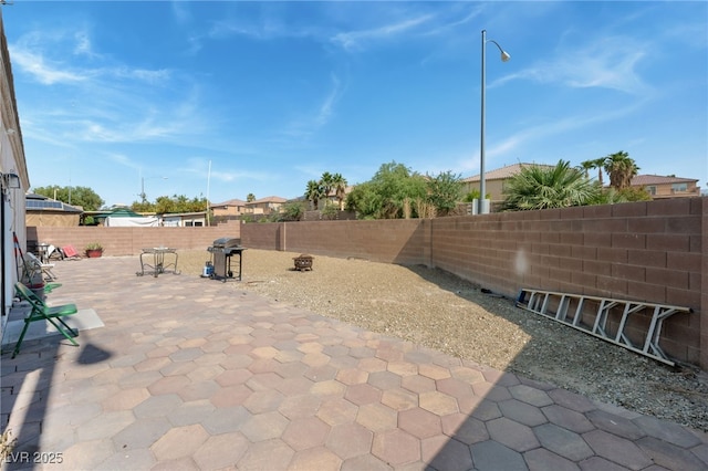 3108 Sentimental Ct, North Las Vegas, NV 89031 - fenced backyard featuring a patio area and grilling area