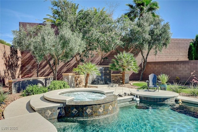 2333 Indigo Island St, Henderson, NV 89044 - view of pool featuring a fenced backyard and a pool with connected hot tub