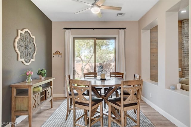 2333 Indigo Island St, Henderson, NV 89044 - dining space with light wood finished floors and a ceiling fan