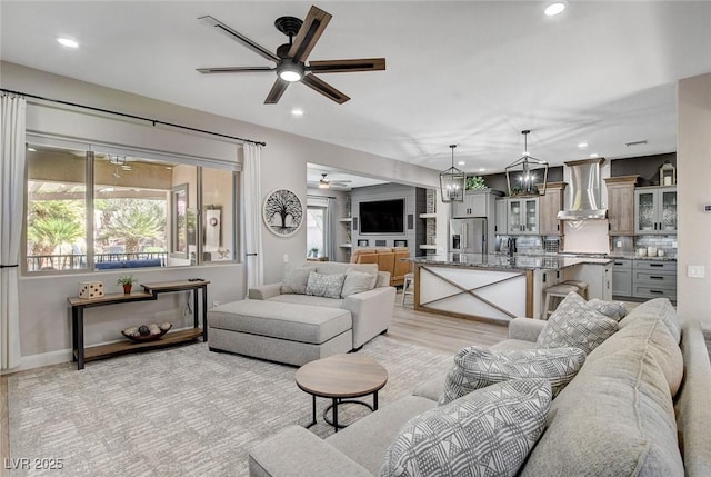 2333 Indigo Island St, Henderson, NV 89044 - living room featuring a ceiling fan, light wood finished floors, and recessed lighting