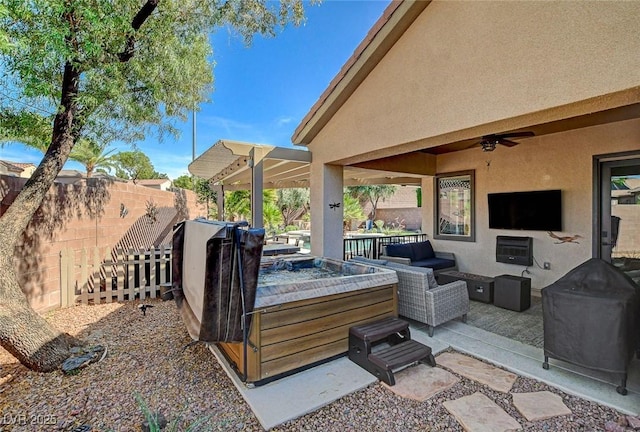 2333 Indigo Island St, Henderson, NV 89044 - fenced backyard featuring an outdoor hangout area, a ceiling fan, a patio area, and a grill