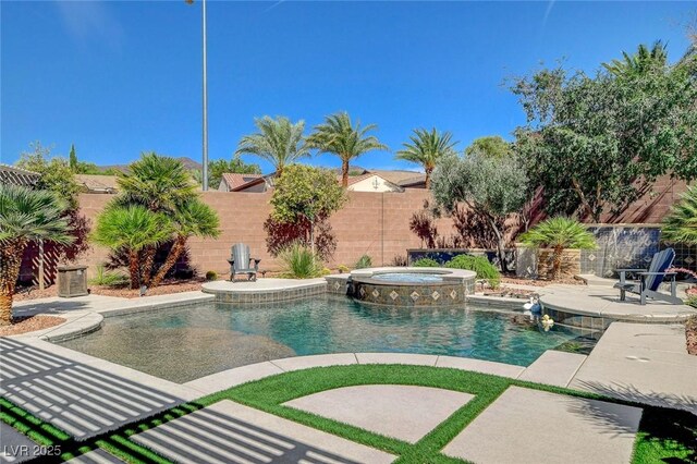 2333 Indigo Island St, Henderson, NV 89044 - view of swimming pool featuring a fenced backyard, a patio area, and a pool with connected hot tub