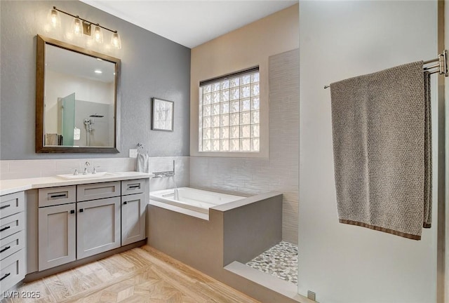 2333 Indigo Island St, Henderson, NV 89044 - full bath with vanity, a garden tub, and walk in shower