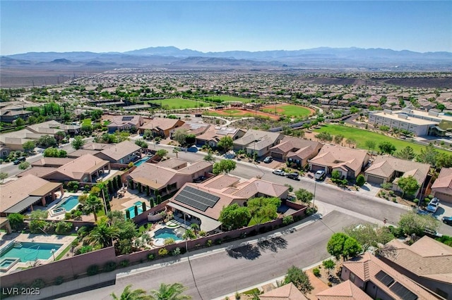 2333 Indigo Island St, Henderson, NV 89044 - aerial perspective of suburban area featuring a pool and mountains