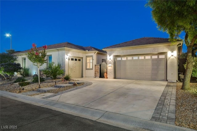 2333 Indigo Island St, Henderson, NV 89044 - single story home featuring an attached garage, driveway, and stucco siding