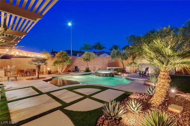 2333 Indigo Island St, Henderson, NV 89044 - pool at twilight featuring an in-ground hot tub, a fenced backyard, a patio area, and a pergola