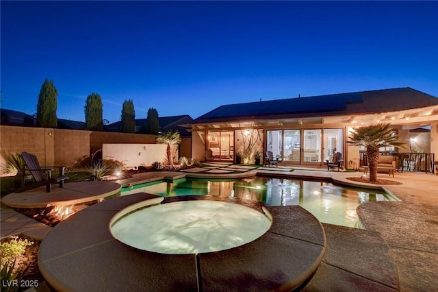 2333 Indigo Island St, Henderson, NV 89044 - view of pool featuring a pool with connected hot tub, a patio, and a fenced backyard