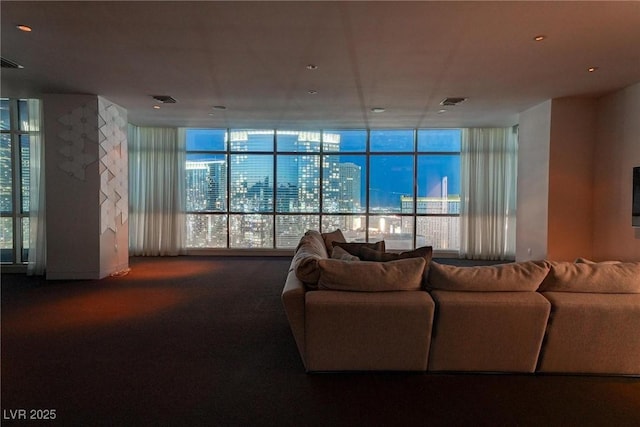 4575 Dean Martin Dr Unit 2607, Las Vegas, NV 89103 - living area with carpet floors and a wall of windows