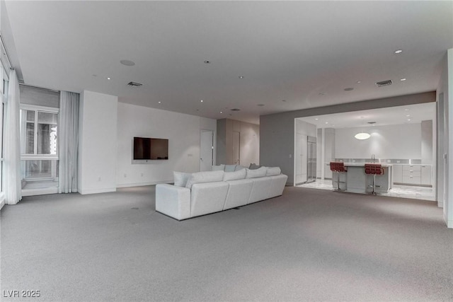 4575 Dean Martin Dr Unit 2607, Las Vegas, NV 89103 - living area featuring light carpet and recessed lighting