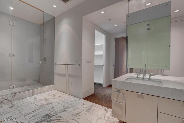 4575 Dean Martin Dr Unit 2607, Las Vegas, NV 89103 - full bathroom with a stall shower, vanity, and recessed lighting