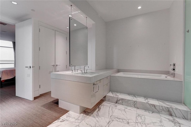 4575 Dean Martin Dr Unit 2607, Las Vegas, NV 89103 - full bath featuring a bath, vanity, ensuite bath, recessed lighting, and marble finish flooring