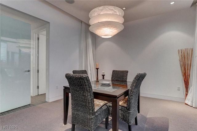 4575 Dean Martin Dr Unit 2607, Las Vegas, NV 89103 - dining room with light carpet and baseboards