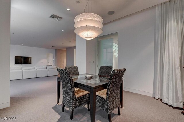4575 Dean Martin Dr Unit 2607, Las Vegas, NV 89103 - dining space with light carpet