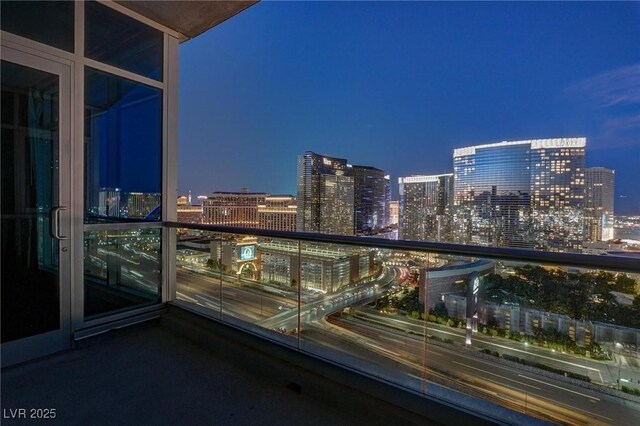 4575 Dean Martin Dr Unit 2607, Las Vegas, NV 89103 - balcony at twilight featuring a view of city lights