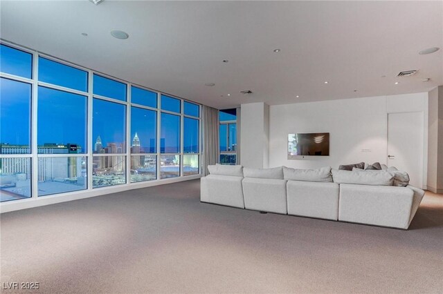 4575 Dean Martin Dr Unit 2607, Las Vegas, NV 89103 - living room with carpet floors and expansive windows