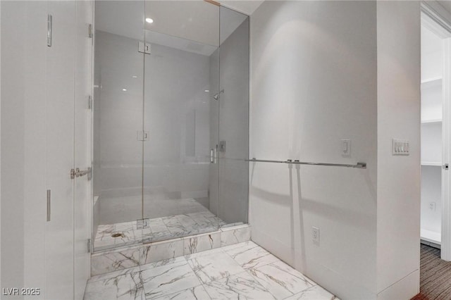 4575 Dean Martin Dr Unit 2607, Las Vegas, NV 89103 - bathroom featuring a shower stall and marble look tiles