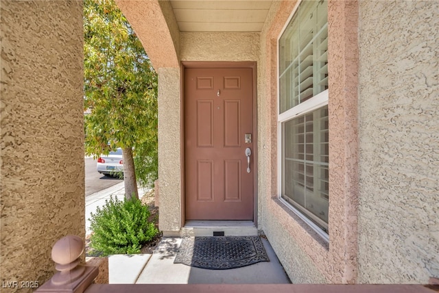 9104 Pearl Cotton Ave, Las Vegas, NV 89149 - property entrance featuring stucco siding