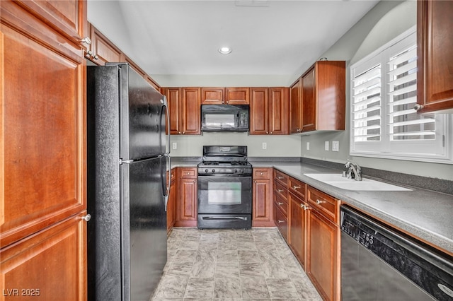 9104 Pearl Cotton Ave, Las Vegas, NV 89149 - kitchen with black appliances, brown cabinetry, and recessed lighting