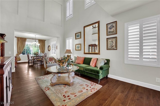 326 Caneflower Ct, North Las Vegas, NV 89031 - living area featuring a chandelier and dark wood-style flooring